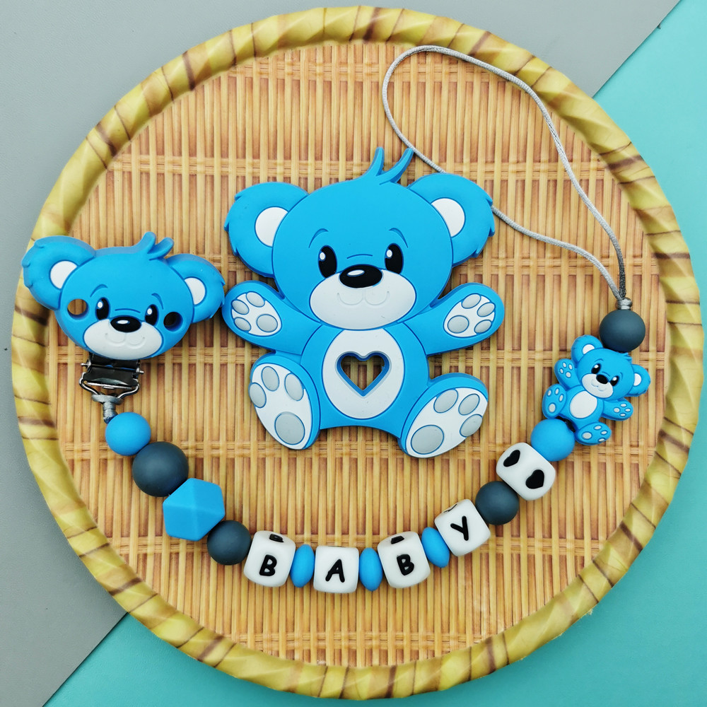 العرف الإنجليزية الروسية سيليك - مراجعة Baby Food Teether وسعره