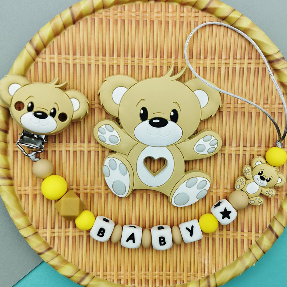 العرف الإنجليزية الروسية سيليك - مراجعة Baby Food Teether وسعره