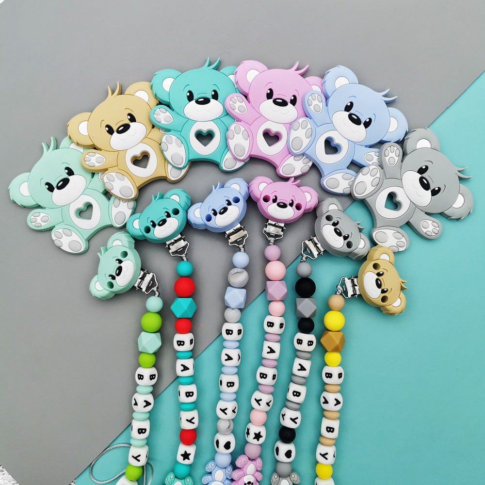 العرف الإنجليزية الروسية سيليك - مراجعة Baby Food Teether وسعره