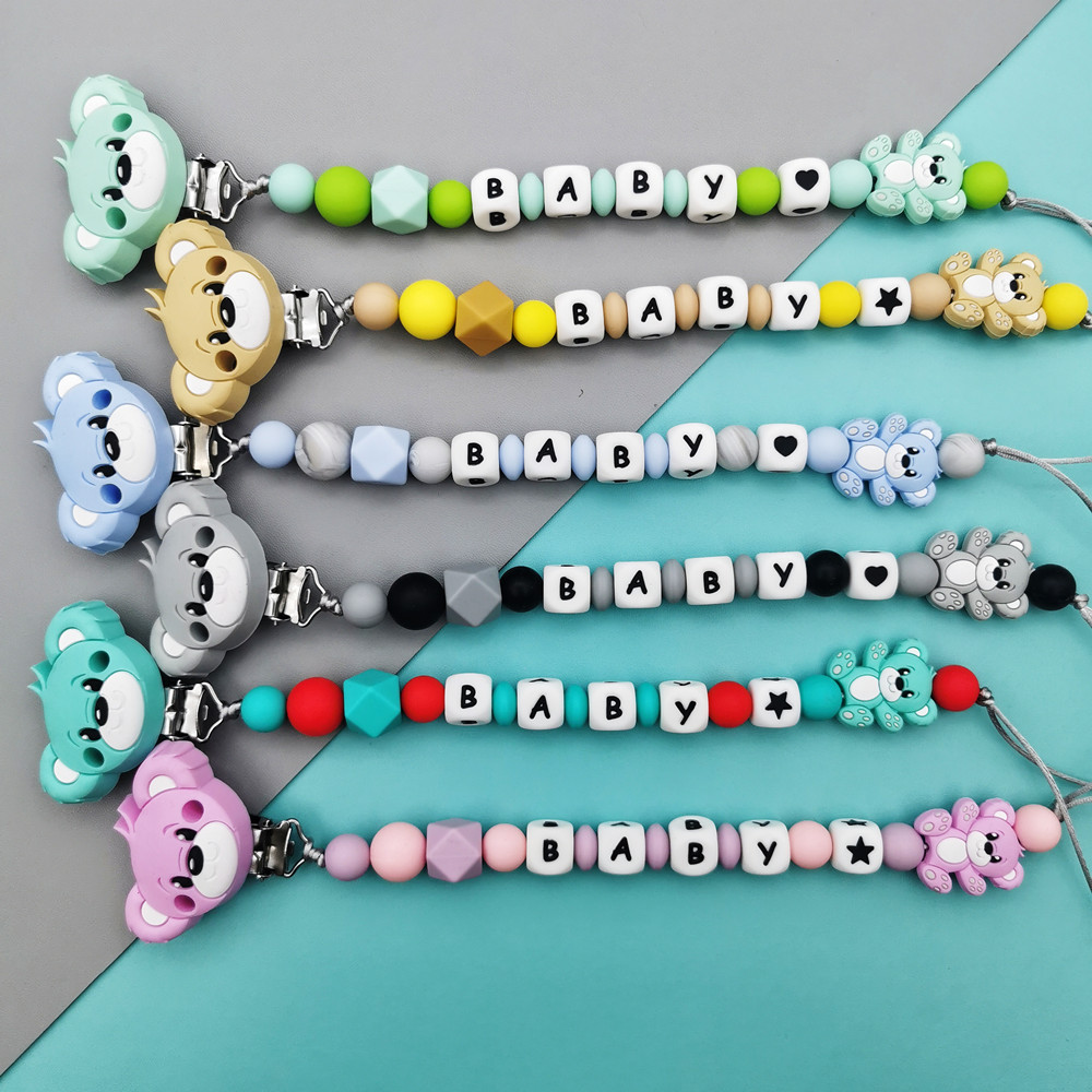 العرف الإنجليزية الروسية سيليك - مراجعة Baby Food Teether وسعره